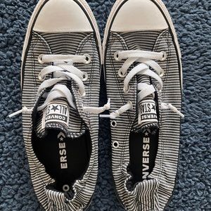 Women’s size 9, Converse all stars. Navy & white striped.
